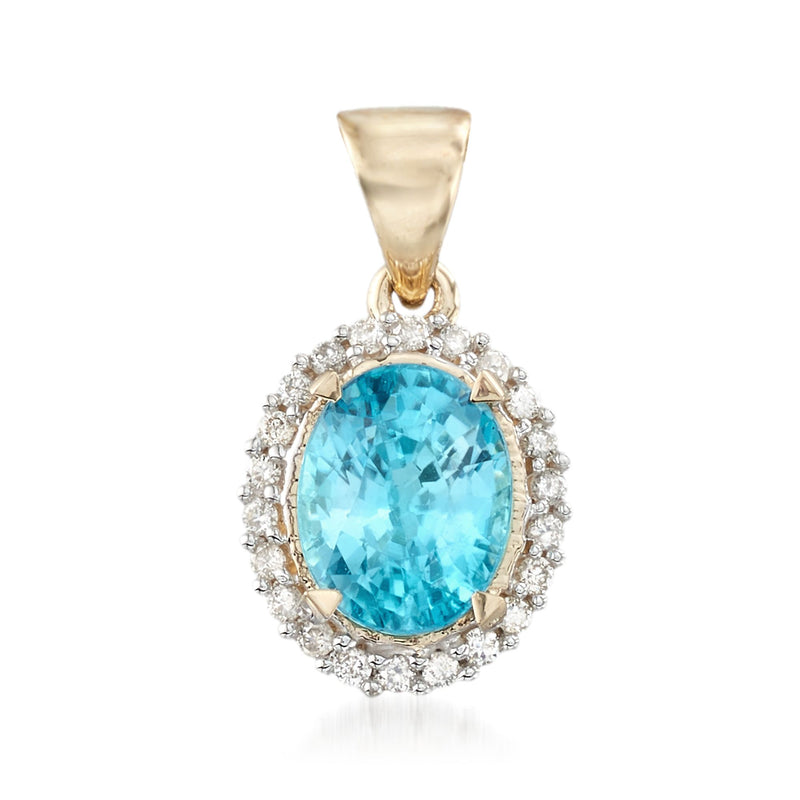 14k yellow gold pendant with oval blue zircon and diamond halo