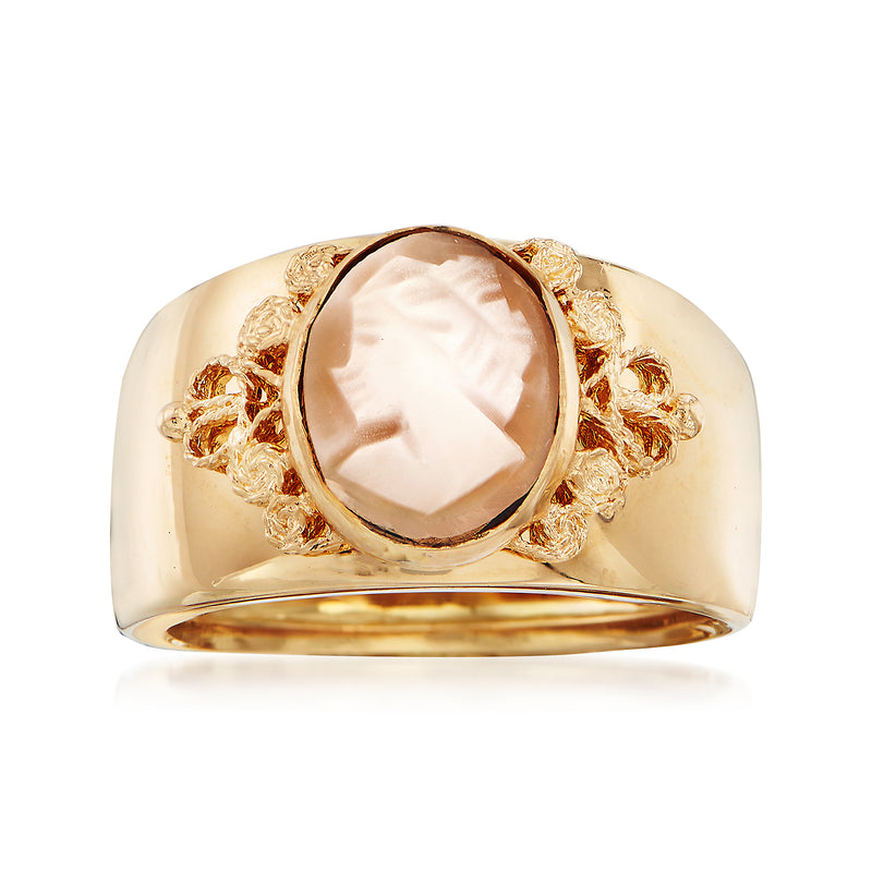 18kt yellow gold cameo ring with oval pink-beige shell and ornate floral bezel
