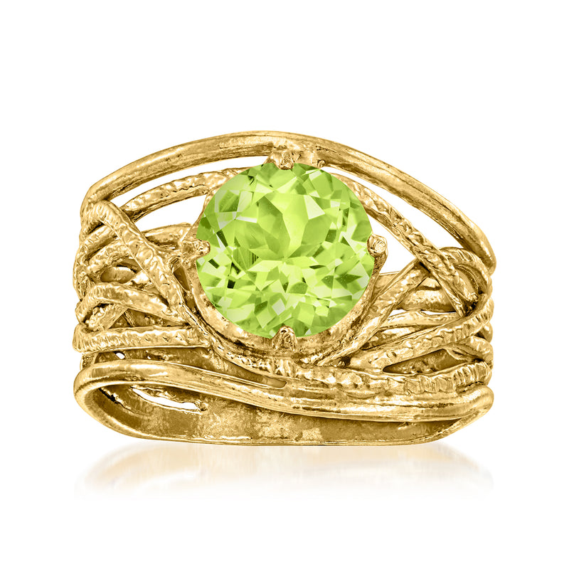 Gold over sterling openwork ring with oval peridot-green gemstone