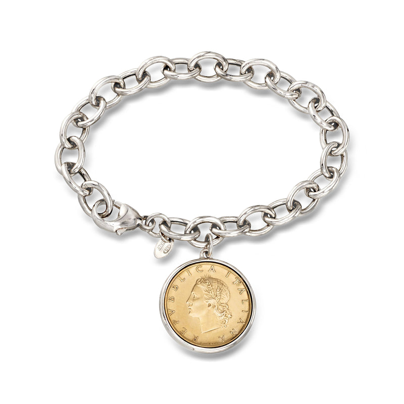 Sterling silver chain bracelet with round gold coin charm and small hanging accents