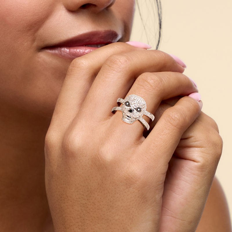 Sterling silver skull ring with black and white diamond accents
