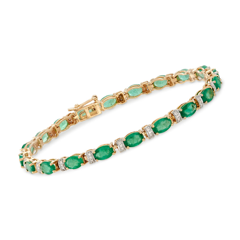 14kt yellow gold station bracelet with oval green emeralds and small diamond accents