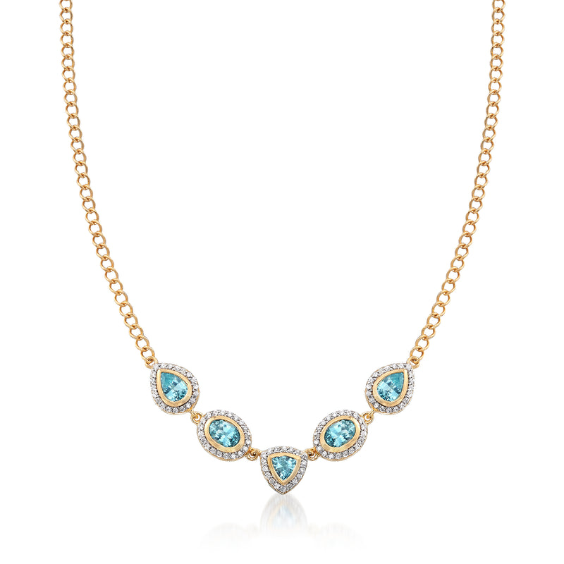 Gold over sterling zircon necklace with blue pear-cut stones and white accents