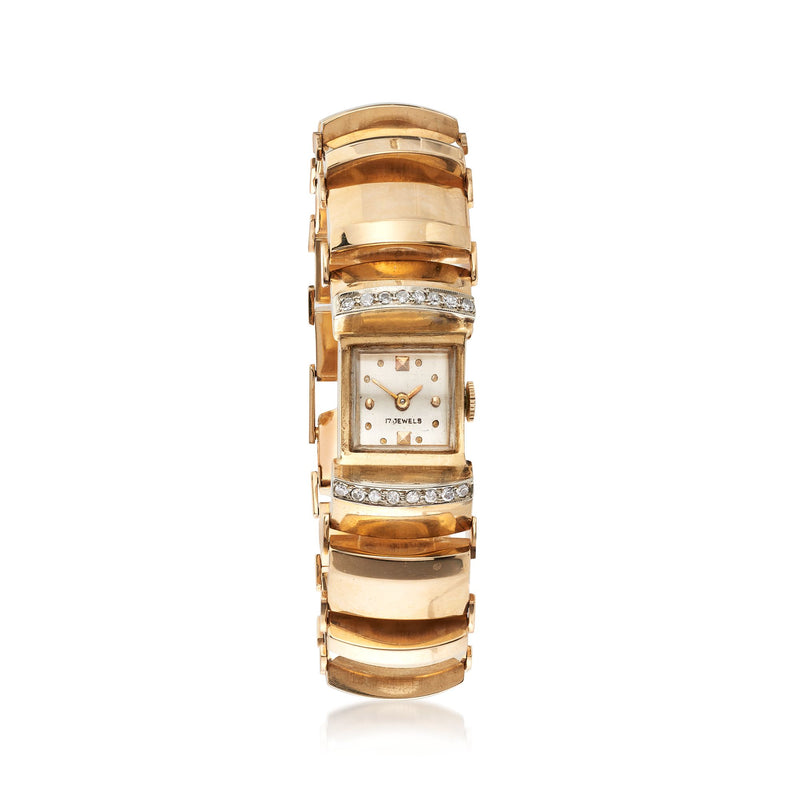 Vintage women's 14kt yellow gold diamond watch with rectangular face and link bracelet