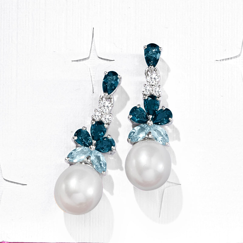 Cultured pearl drop earrings with blue topaz marquise and round accents, clustered design