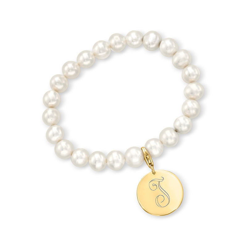 Cultured pearl bracelet with 14kt yellow gold disc charm and cursive initial