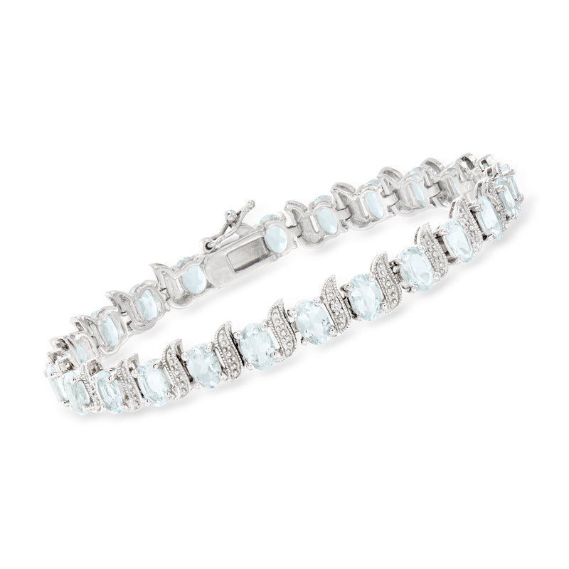 Sterling silver tennis bracelet with light blue aquamarine stones and diamond accents