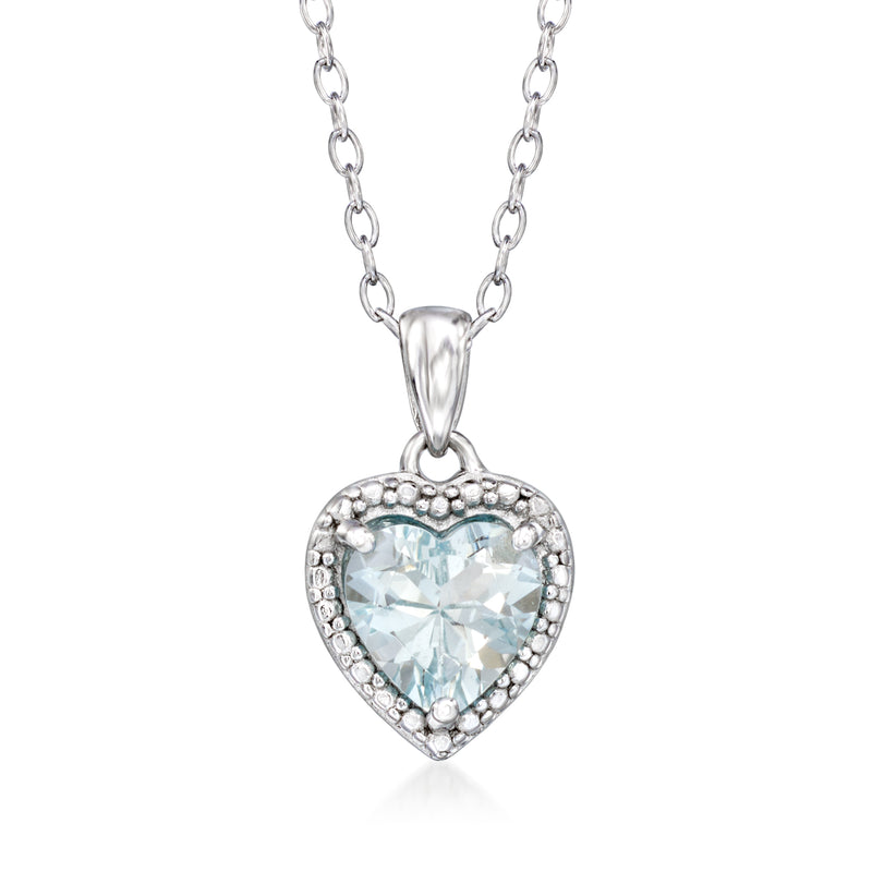 Sterling silver heart pendant necklace with light blue gemstone and halo