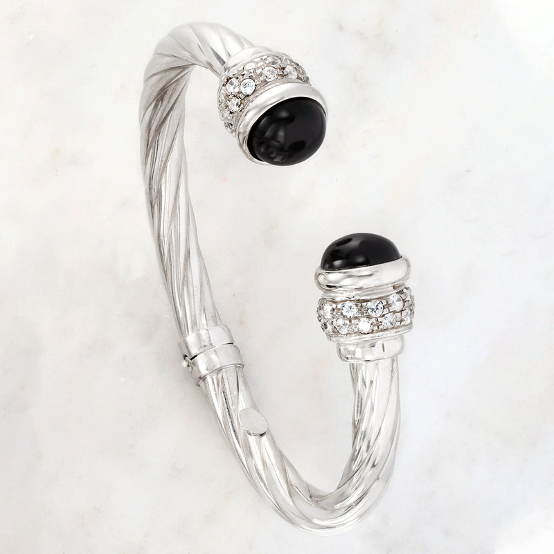 Sterling silver twisted cuff bracelet with round black onyx centerpiece and CZ rows