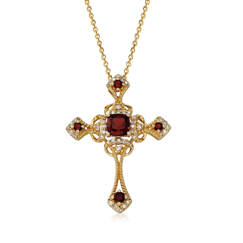 14kt yellow gold cross pendant with garnet center and diamond accents