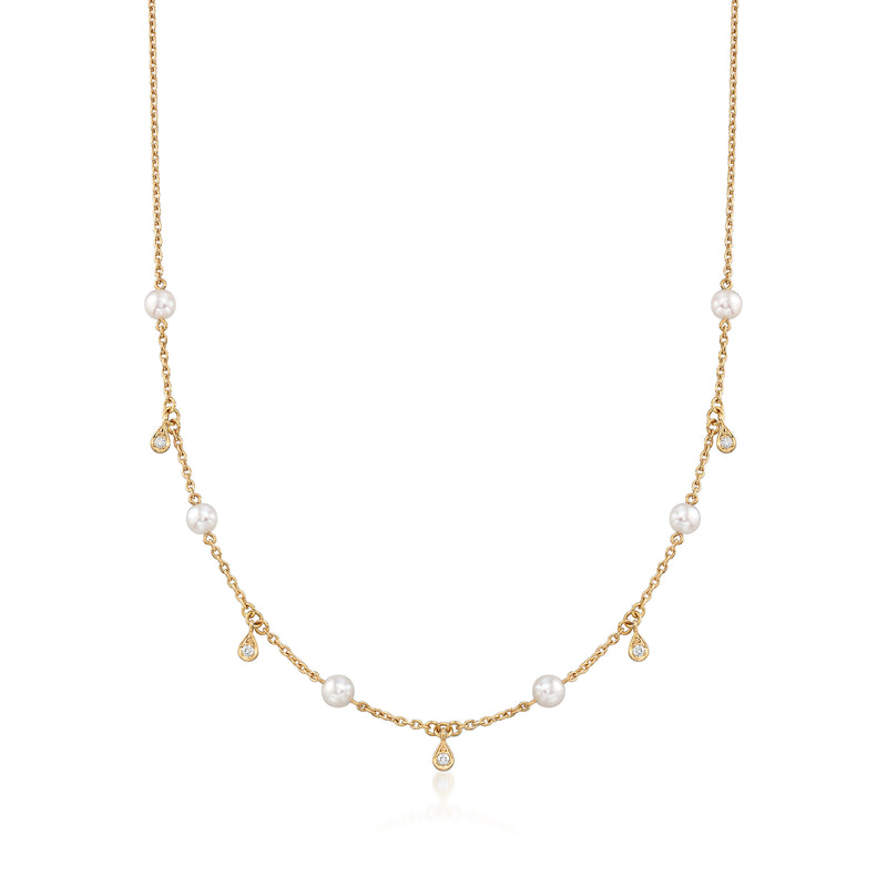 Akoya pearl station necklace in 18kt yellow gold with small diamond accents