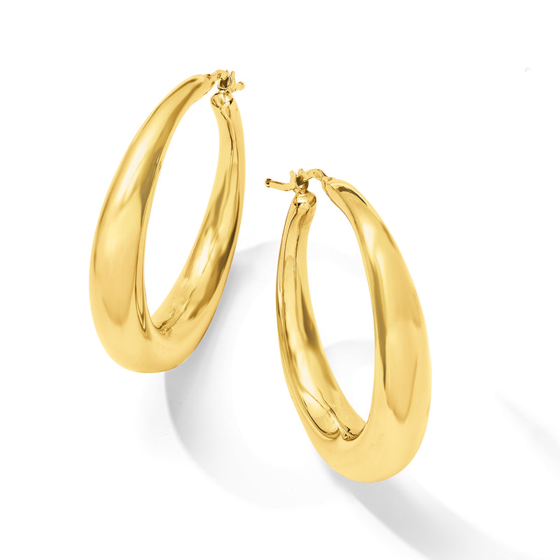 Yellow gold graduated hoop earrings, oval shape, angled side view