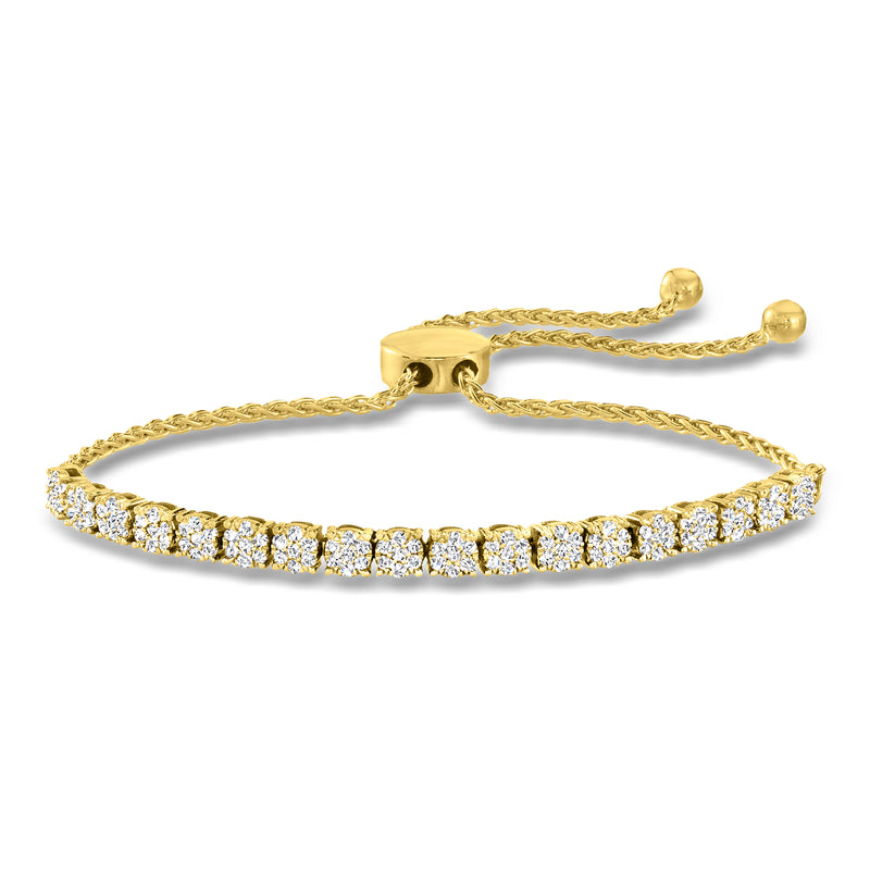 Gold bolo bracelet with diamond-look cluster stations and round adjustable tips.
