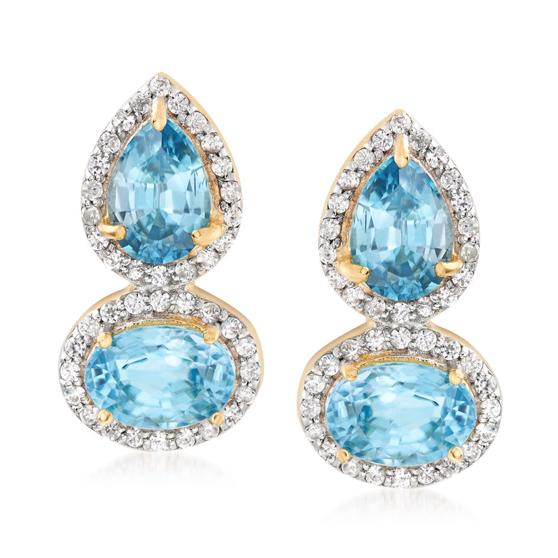 Blue zircon drop earrings with gold setting, pear and oval blue stones, white halo