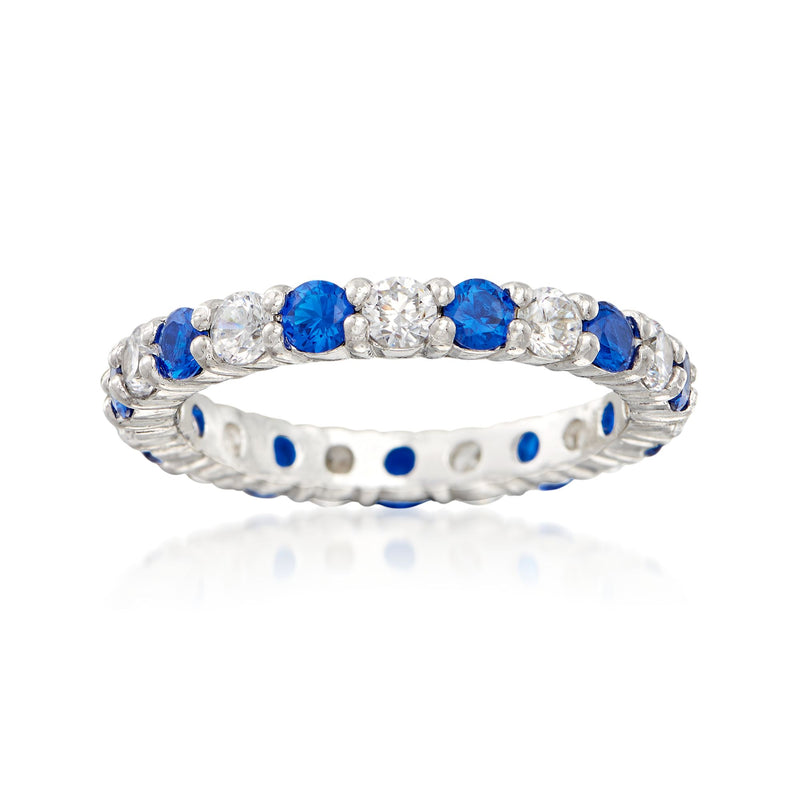 Sterling silver eternity band with blue and clear round CZ stones, shared prong design