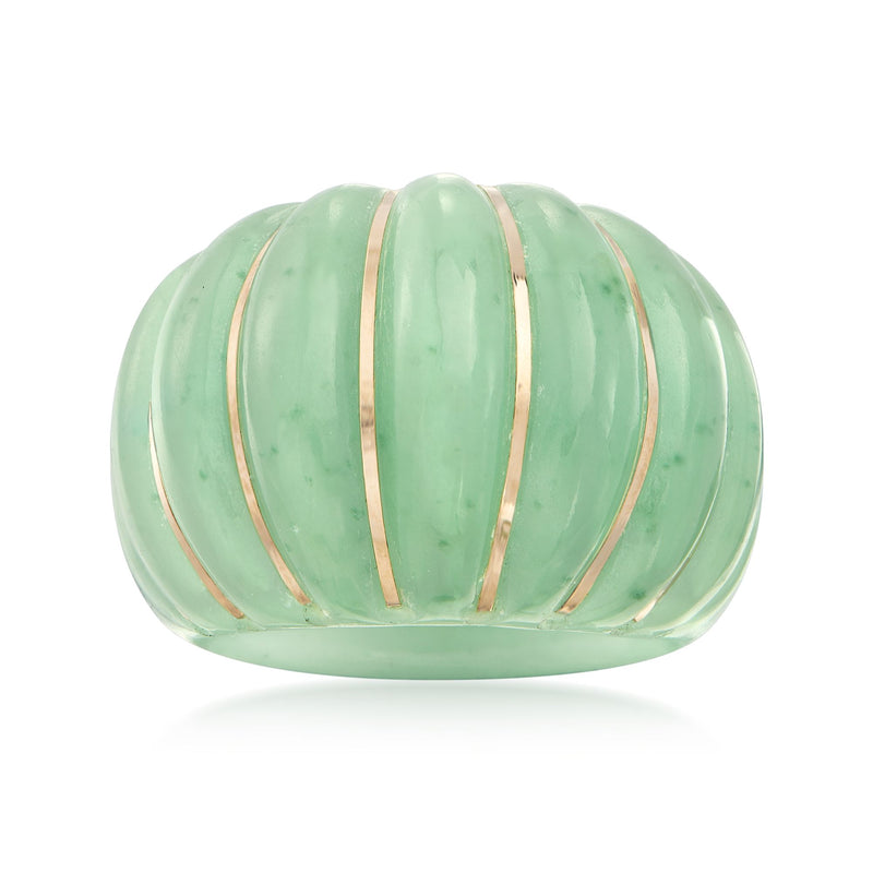 Carved mint green jade ring with three slim 14kt yellow gold bands