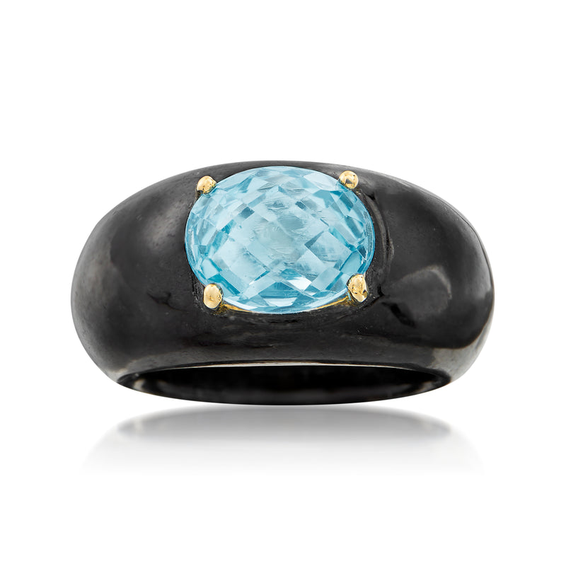 Black jade ring with oval blue topaz and yellow gold prong setting