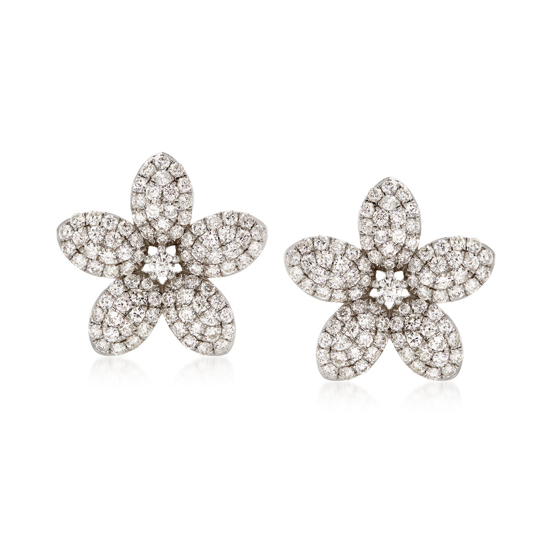 Diamond flower stud earrings with clustered round stones, five-petal design