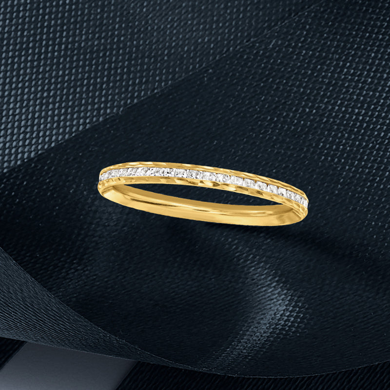 14kt yellow gold CZ eternity band with slim profile and stones along the rim
