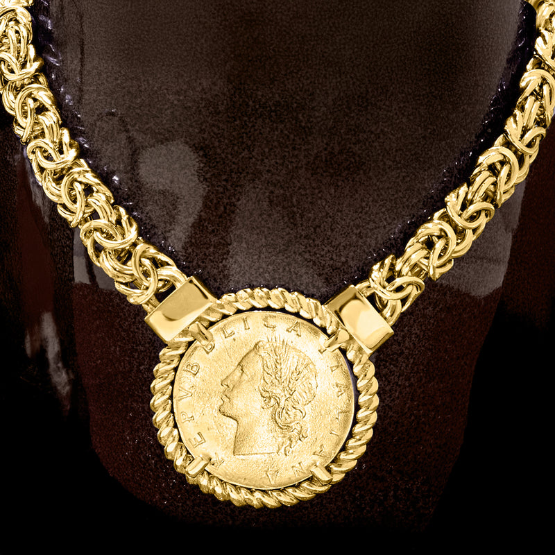 Gold-tone necklace with double curb chains and round coin pendant with rope rim