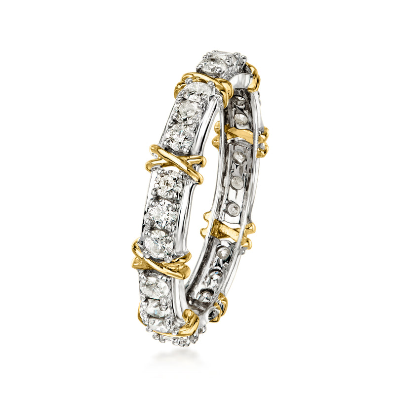 Side view of diamond eternity band with sterling silver band and 14kt gold bezels