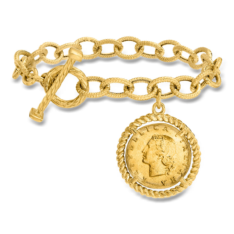 Gold-tone oval-link toggle bracelet with round coin charm and chain toggle clasp