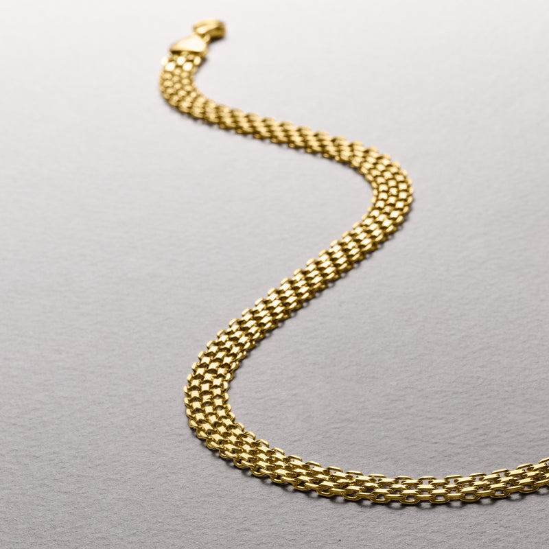 Yellow gold bismark-link necklace close-up of chain and clasp