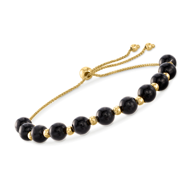 Black onyx bead bolo bracelet with 14kt yellow gold accents and braided chain slider