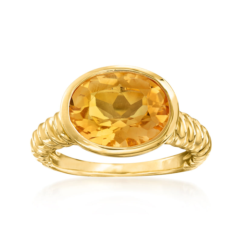 Gold over sterling oval citrine ring with twisted split shank, bezel-set yellow stone