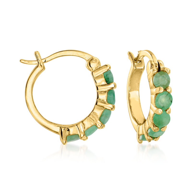 Gold-tone huggie hoop earrings with round green gemstone accents