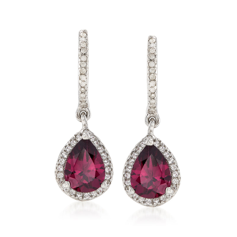 Sterling silver drop earrings with pink rhodolite garnet teardrop and diamond halo.