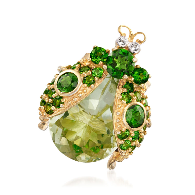 Green multi-stone beetle lapel pin with oval emerald-cut and round crystal accents