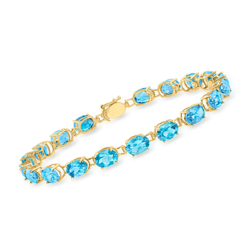 Oval Swiss blue topaz bracelet in 14kt yellow gold