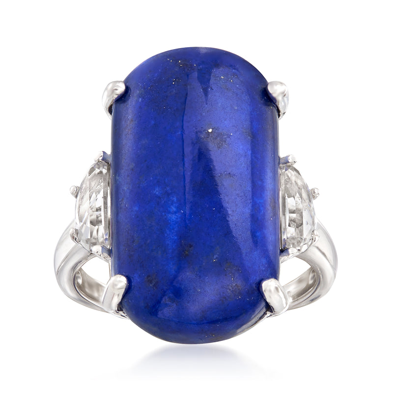 Sterling silver ring with blue lapis centerpiece and white topaz side stones