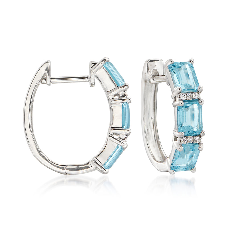 14k white gold huggie hoop earrings with blue aquamarine stones in prong settings