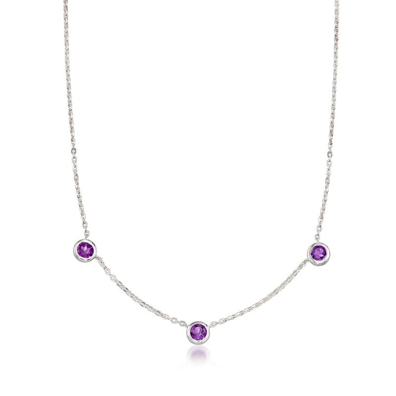 Zina sterling silver amethyst three-stone necklace with three round purple gemstones on stations