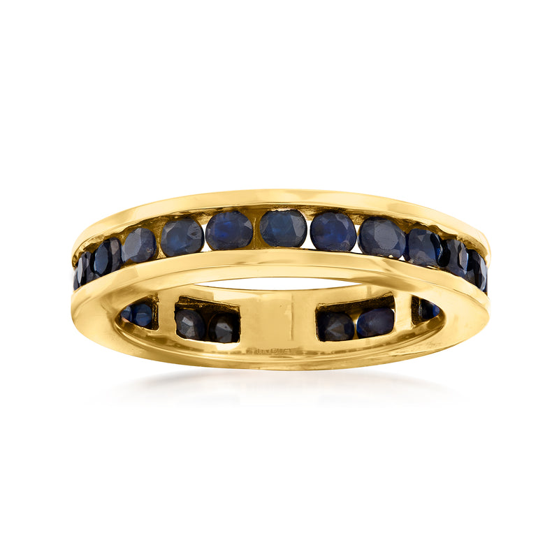 14kt yellow gold eternity band with channel-set dark blue sapphires