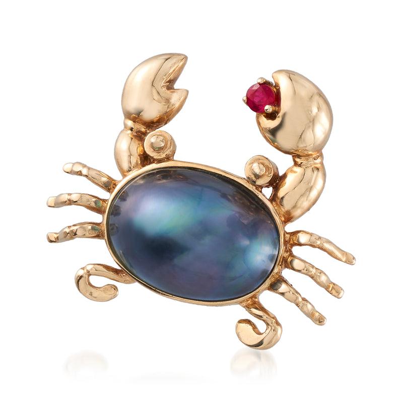 Gold crab pin with oval blue-gray mabe pearl and red ruby accent