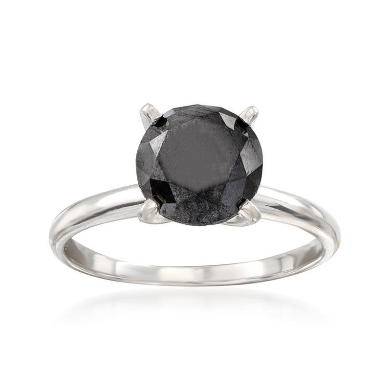 Black diamond solitaire ring with faceted dark stone, four prongs, white gold band