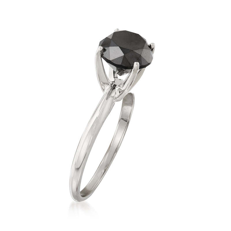 Black diamond solitaire ring with faceted dark stone, white gold band and prong setting