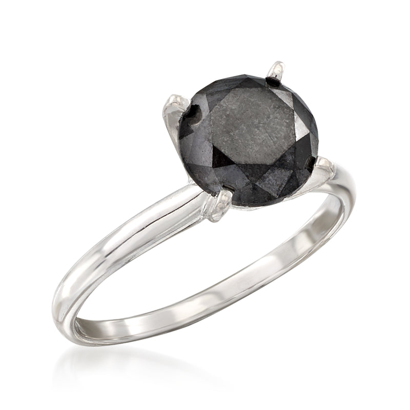 Black diamond solitaire ring with faceted dark center stone, slim white gold band