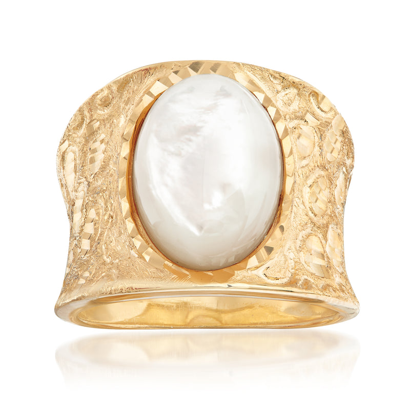Gold over sterling ring with oval mother-of-pearl cabochon and diamond-cut bezel
