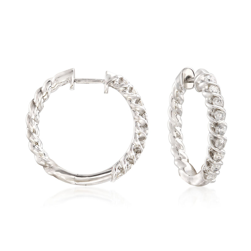 Sterling silver spiral hoop earrings with small round diamond accents