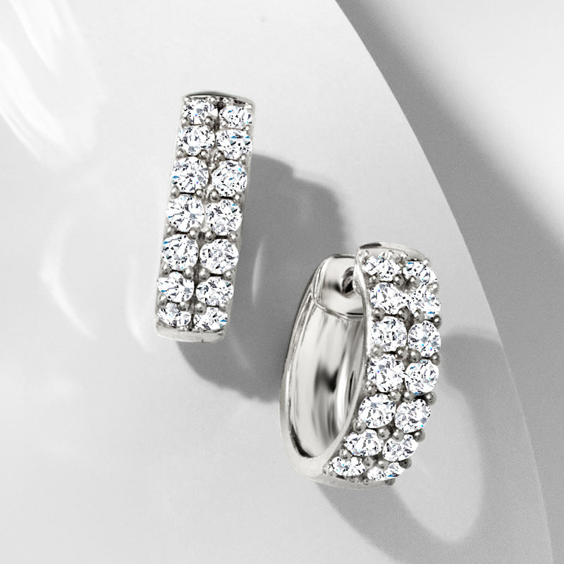Sterling silver diamond huggie hoop earrings with pavé-set round stones