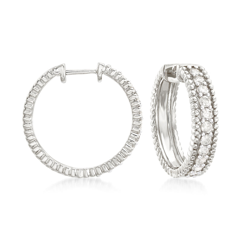 Sterling silver diamond-beaded hoop earrings, sparkling pave outer ring with hinged clasp.