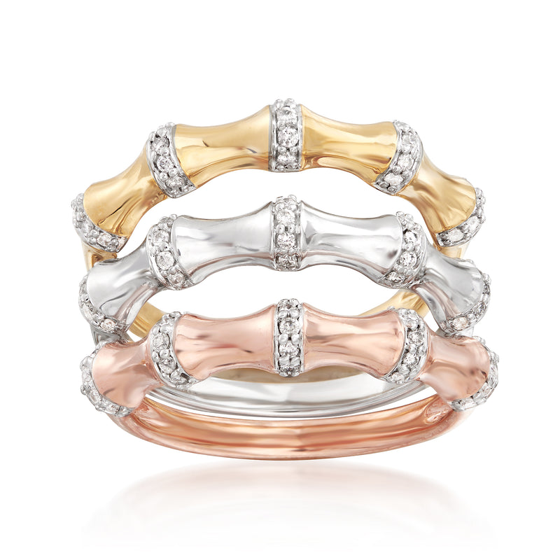 Three bamboo-style stackable rings in tri-colored gold with small pave diamond accents