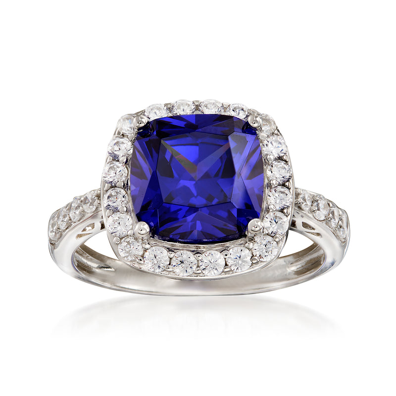 Sterling silver ring with blue square cushion stone and round CZ halo
