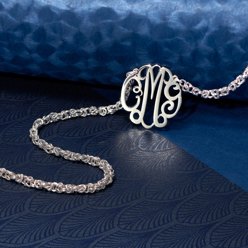 Sterling silver chain necklace with large circular monogram pendant
