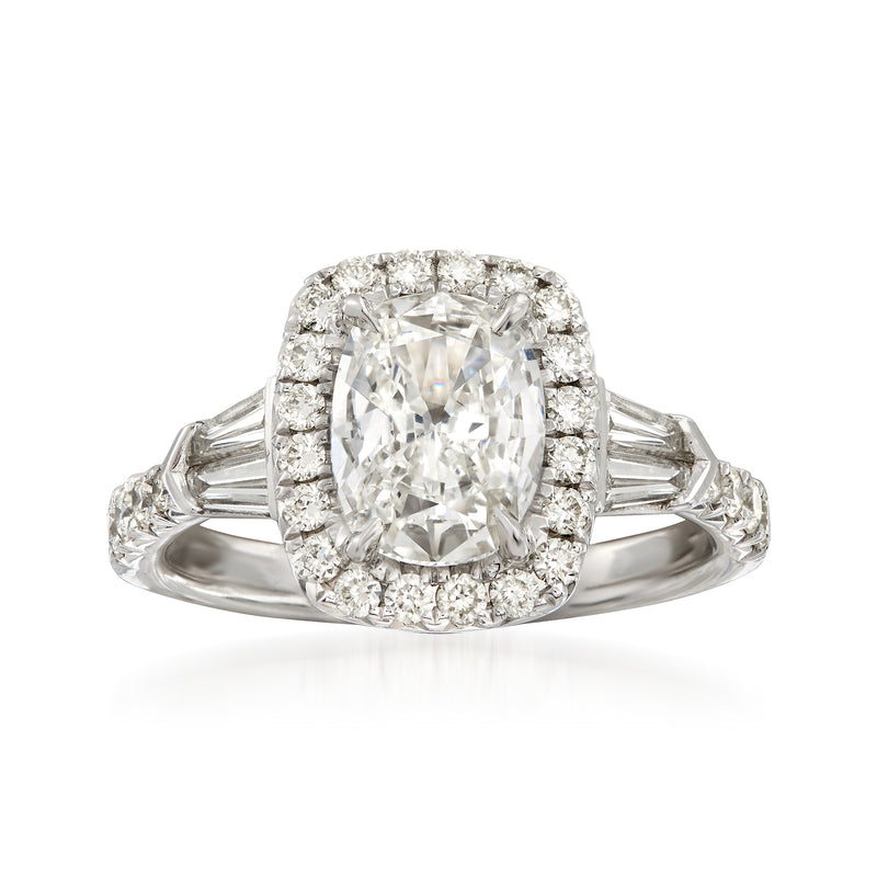 18kt white gold diamond engagement ring with cushion-cut center and halo