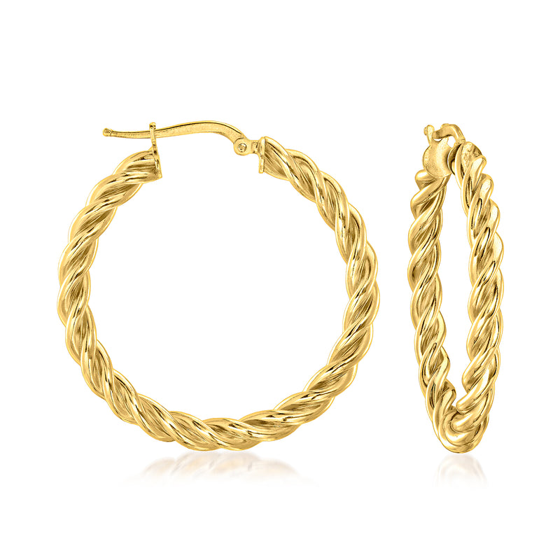 Twisted gold hoop earrings with twisted rope texture and hinged clasp